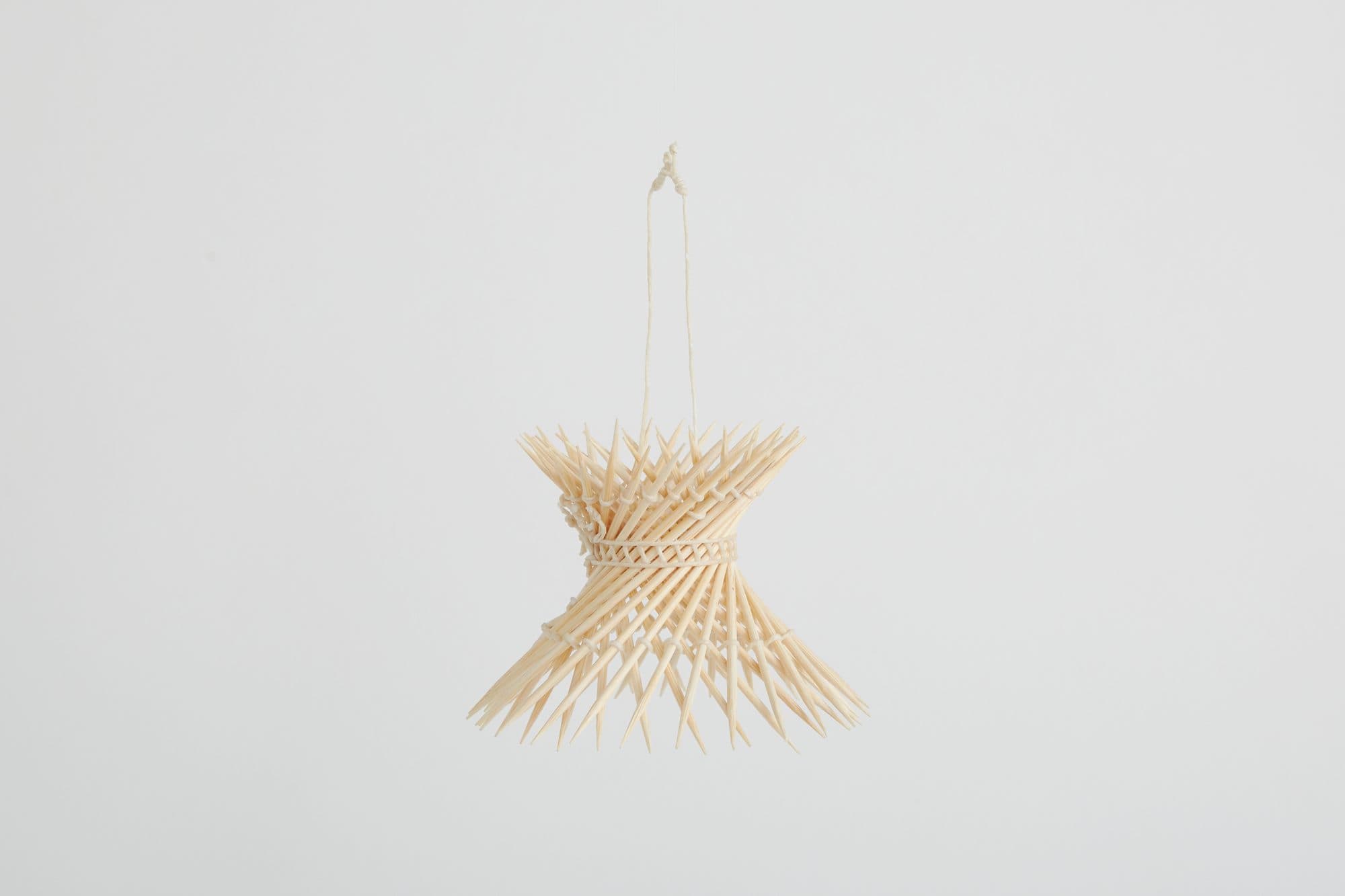 Woven wood hourglass ornament by Indo