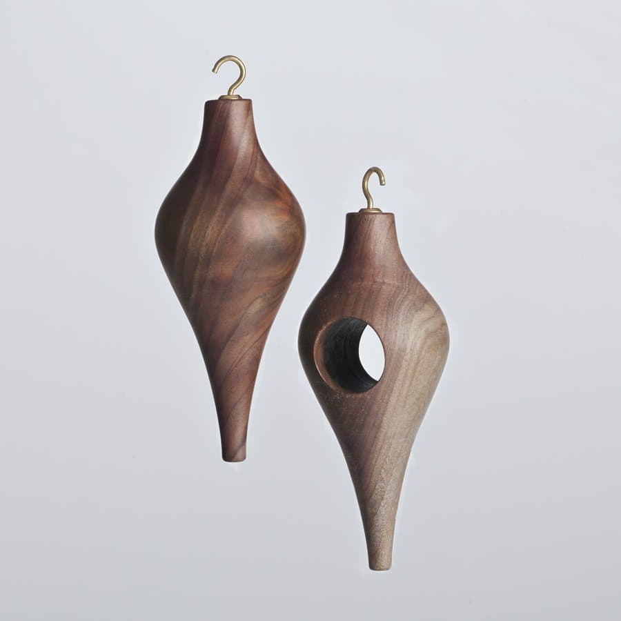 Pair of carved walnut drops by SHIMNA