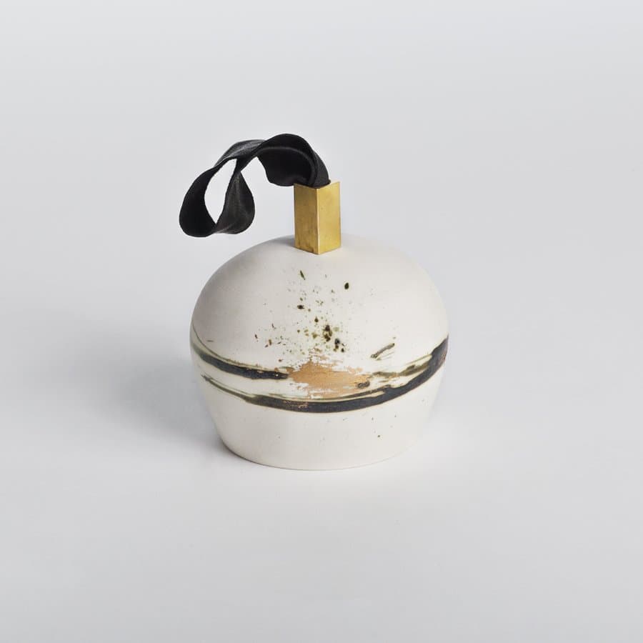 Porcelain bell ornament with brushed gold by Studio Joo