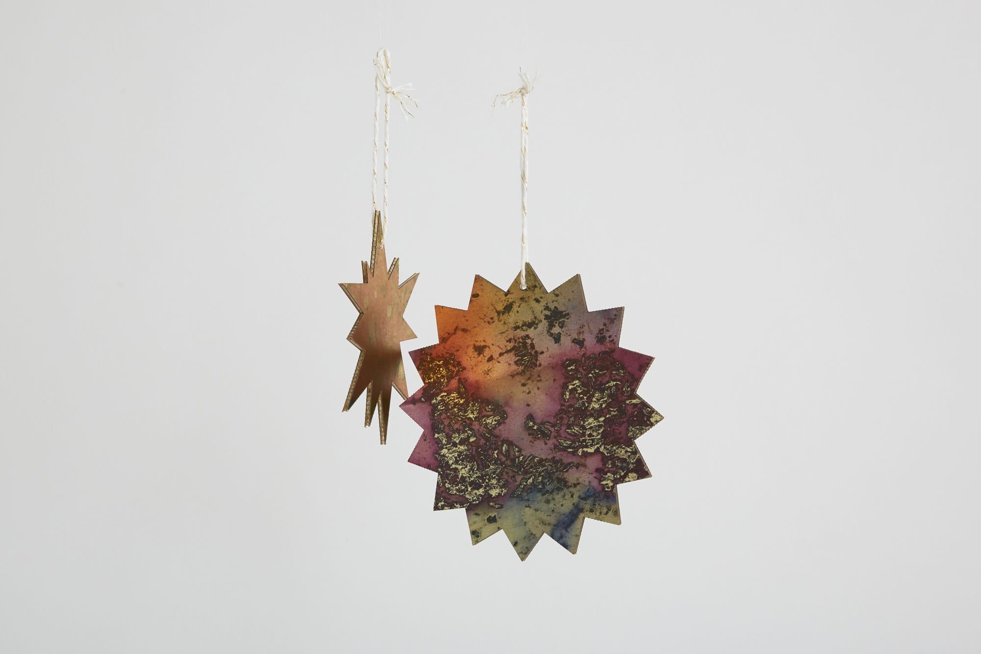 Printed paper star ornaments by Wallpaper Projects
