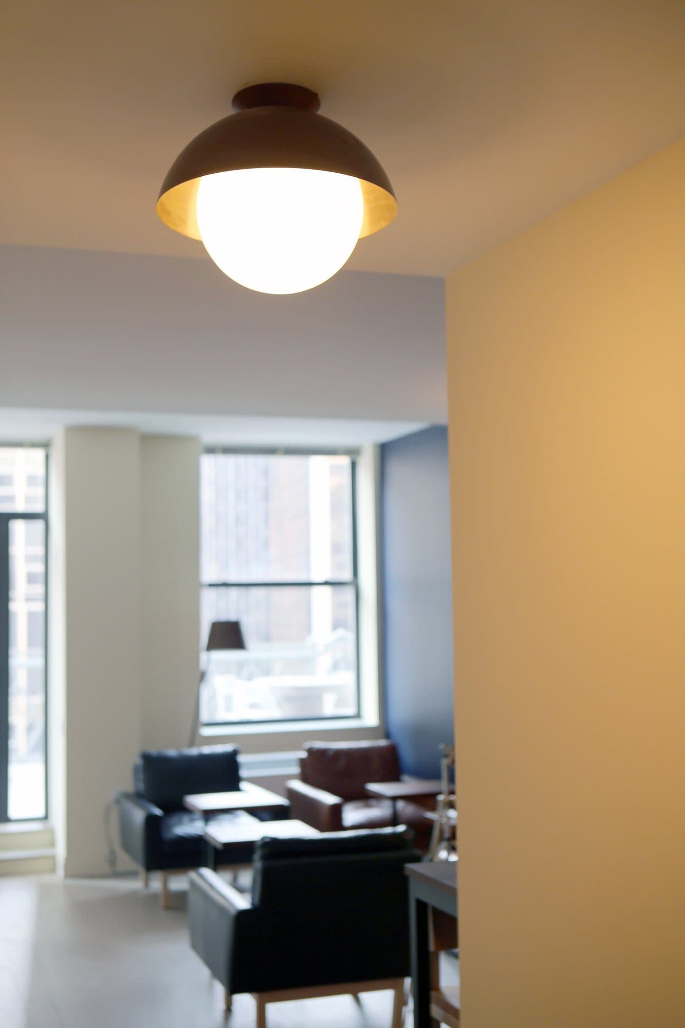 Hallway toward the TV lounge on the 70 Pine amenity floor