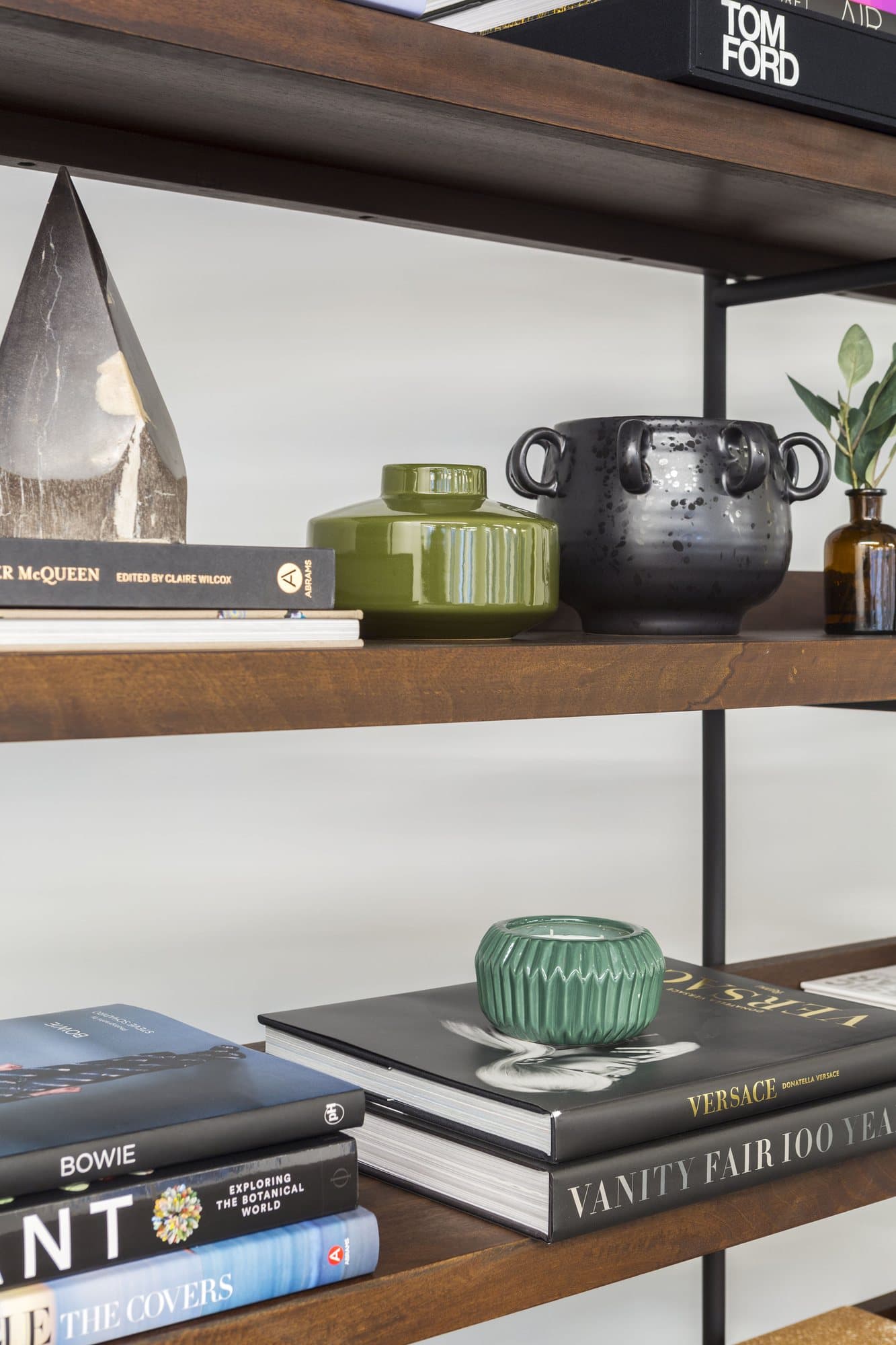 Shelving styled with books and ceramics
